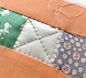 Hand Quilting on a Quilt Top