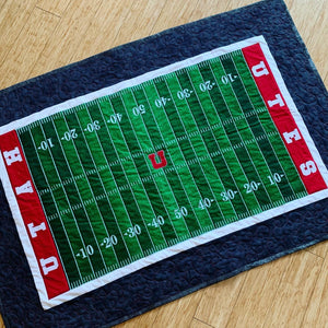 Baby quilt for University of Utah football fans. I looks like the football field at the stadium.