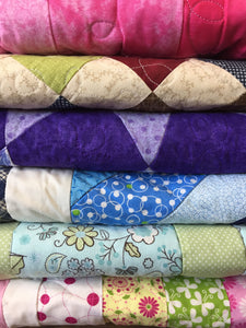 Stack of Folded Quilts