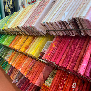 Rows of Bolts of fabrics