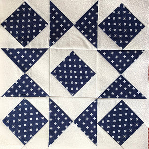 Combination Star Quilt Block in white and navy blue