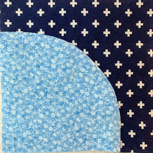 Sewing Curved Quilt Pieces - blue curved quilt piece sewn together