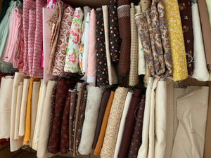 Fabric Organizing - box of organized folded fabric