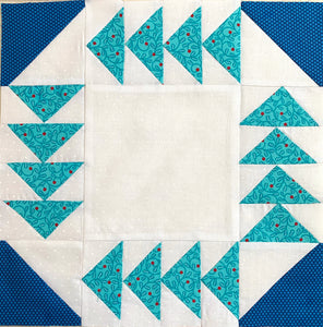 Fox and Geese Quilt Block. Featuring teal flying geese and navy blue half square triangles