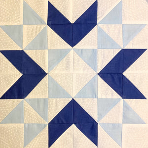 Wyoming Valley Quilt Block made of Blue and White Half Square Triangles. 