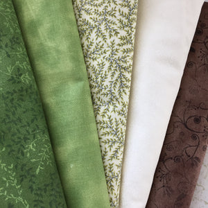 Fabric selection for the Irish Woodland Quilt in Greens and Brown