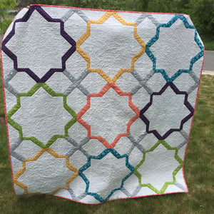 Moroccan Lullaby Quilt in white and light colors. Pattern by Melissa Corry