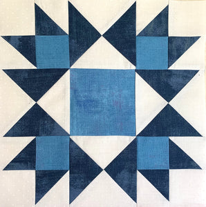 Honeymoon Quilt Block made with dark blue, light blue, and white