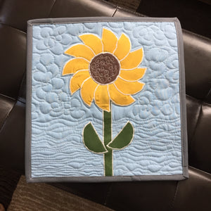 Sunflower Mini Quilt table runner with blue background