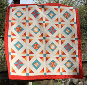 All Seasons Squares Quilt Pattern in Red, Teal, and Yellow