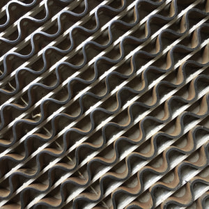 Finding Quilt inspiration in a metal floor grate