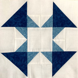 Dandy Quilt Block made in blue and white with triangles