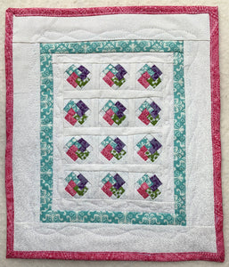 Card Trick Mini Quilt in Purple, Teal, Green, and Pink. 