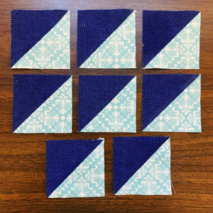 Eight HSTs at a time - showing 8 half square triangles in blue and teal