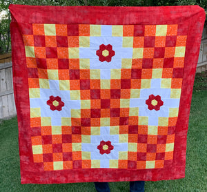 Red version of the Irish Woodland Quilt with red, orange, yellow