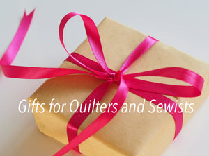 Brown paper package with pink ribbon