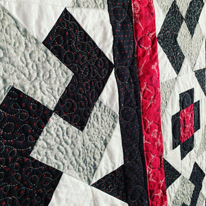 Close Up Not So Tricky Quilt Pattern  in Red, Grey, Black, And White