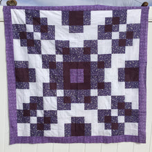 Counterbalance Quilt  made in Purple, Violet and White. Beginner quilt, made with squares.