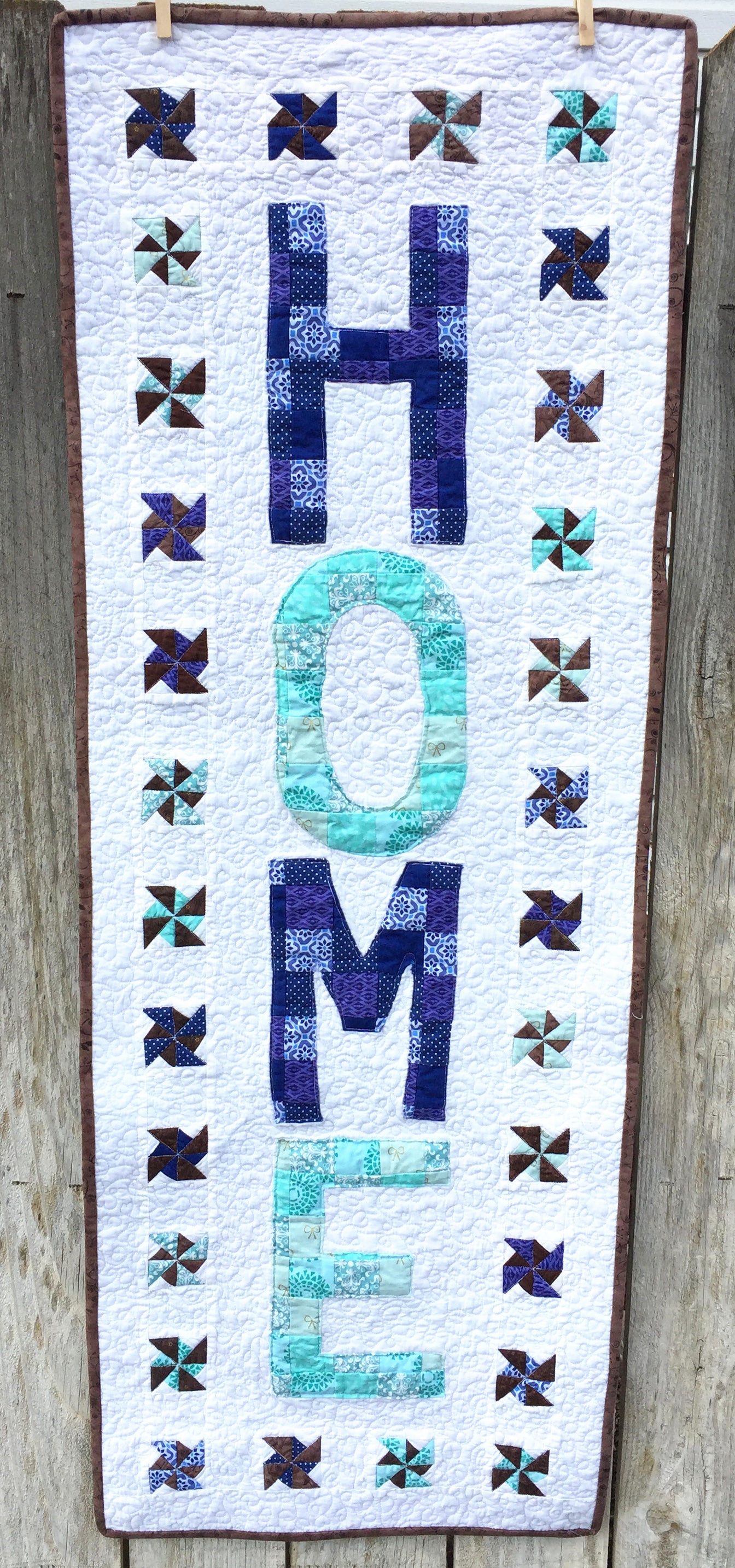 Love At Home Wall Hanging or Mini Quilt made in blue and teal green