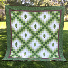 Irish woodland Quilt - queen size - irish chain quilt with a forest of green trees.