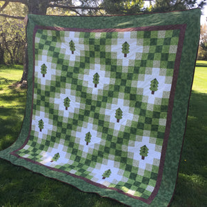 Side view of Irish woodland quilt in green for pattern